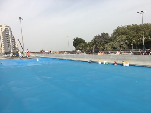 Polyurethane spray applied waterproofing system